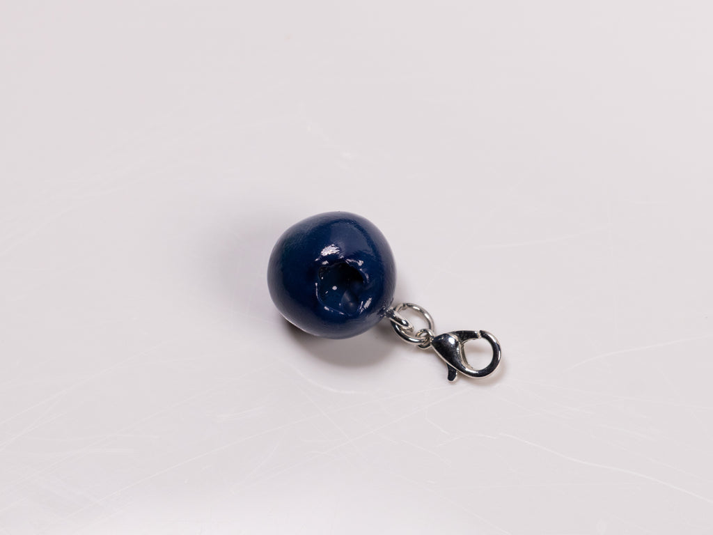 Miniature handmade blueberry clay charm
