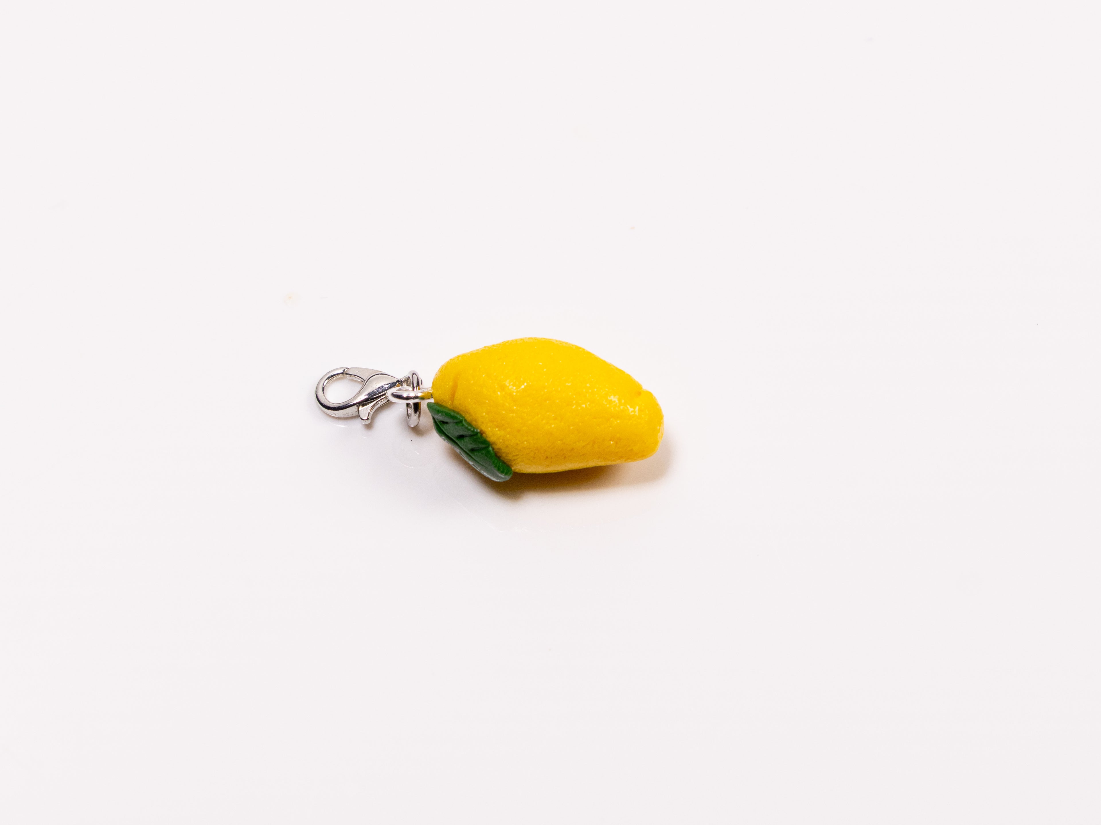 Miniature handmade lemon clay charm
