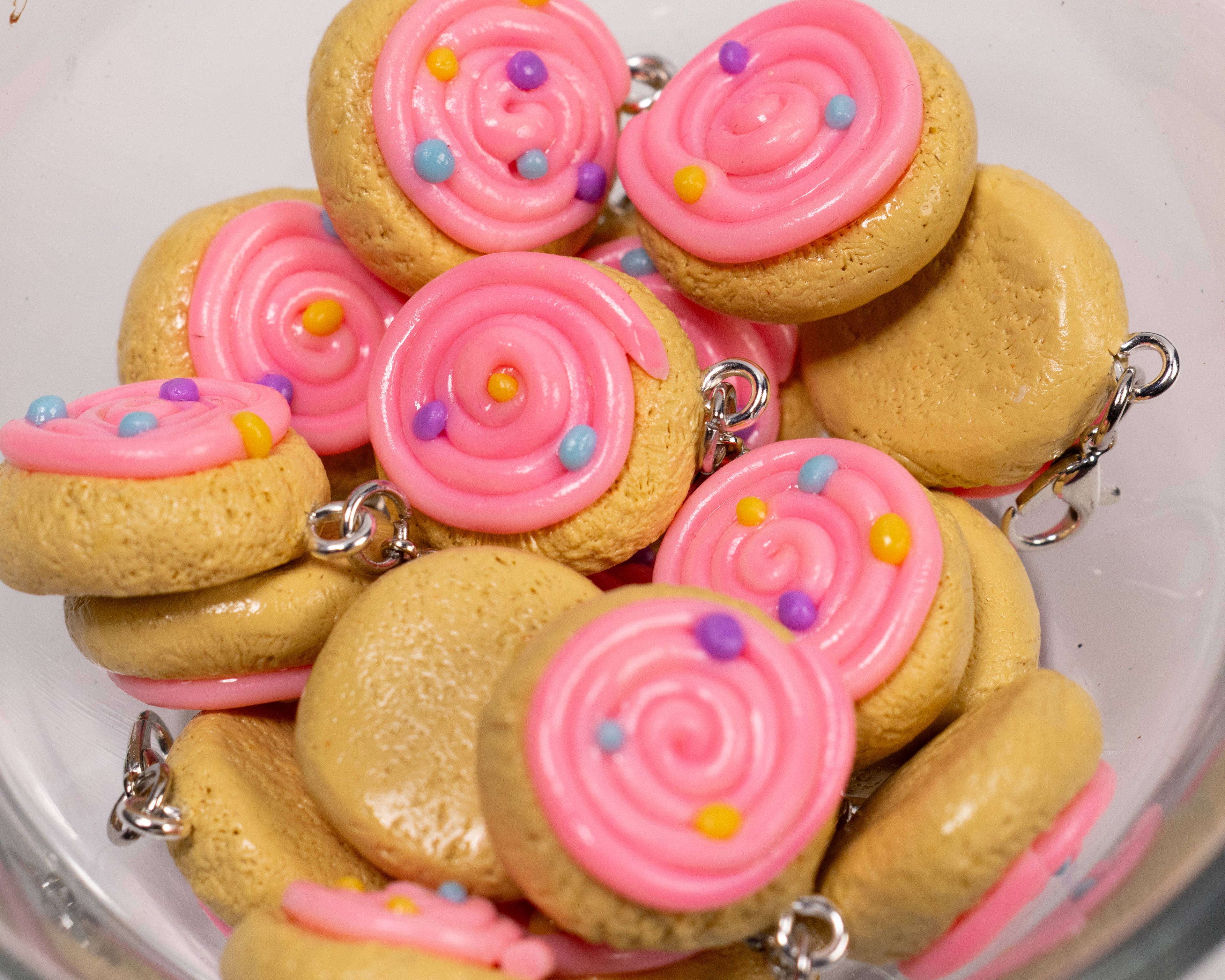 Miniature handmade pink sugar cookie clay charm