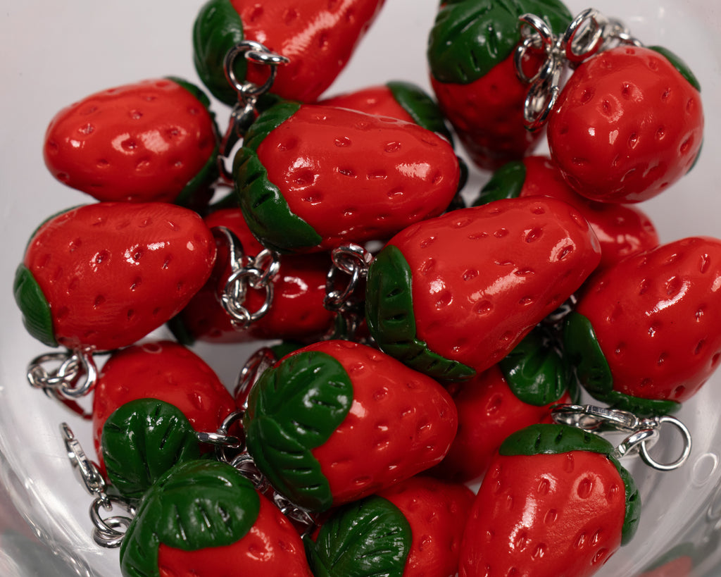 Miniature handmade strawberry clay charm