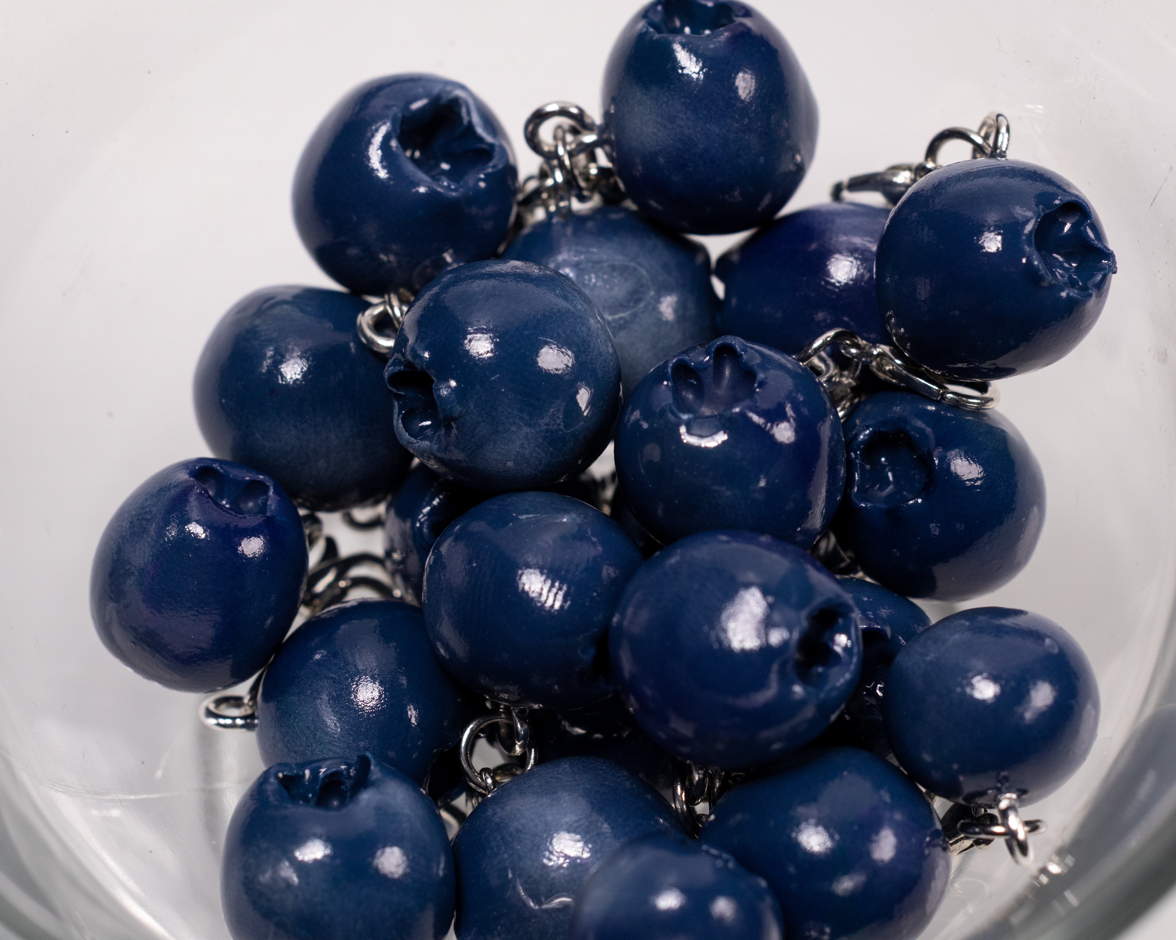 Miniature handmade blueberry clay charm