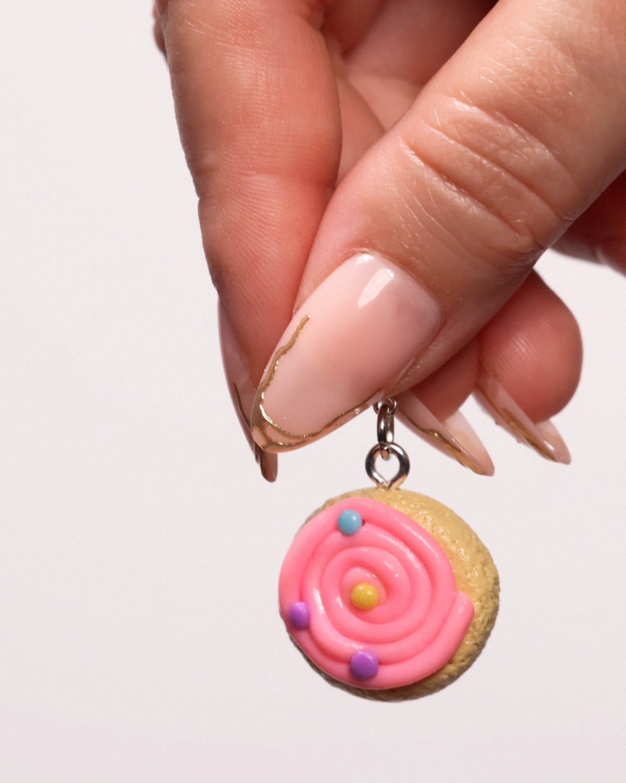 Miniature handmade pink sugar cookie clay charm